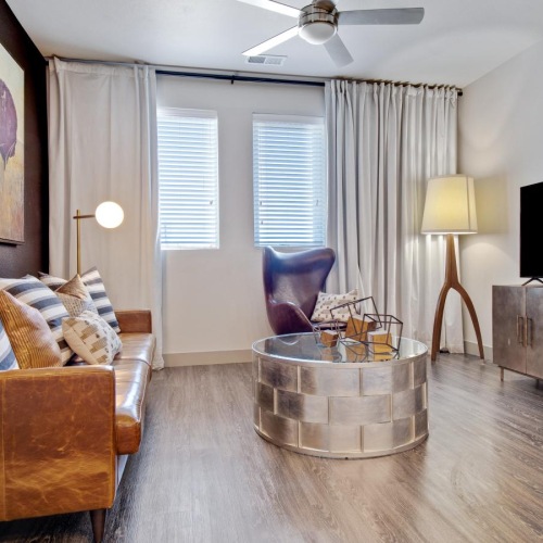 a living room with a tv and couch