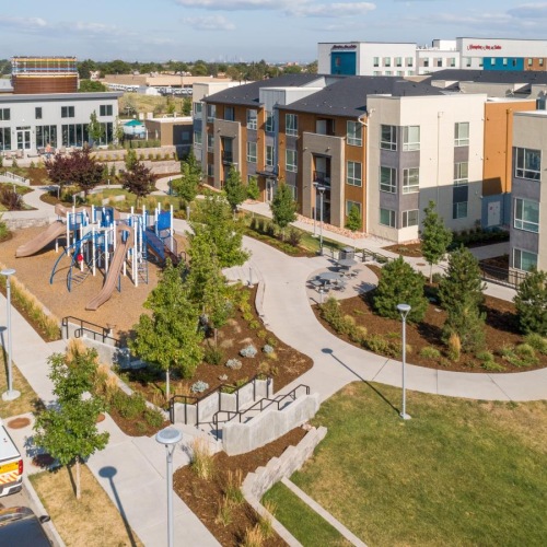 a street with cars and buildings